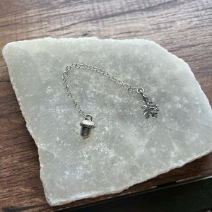 Pewter acorn pendulum